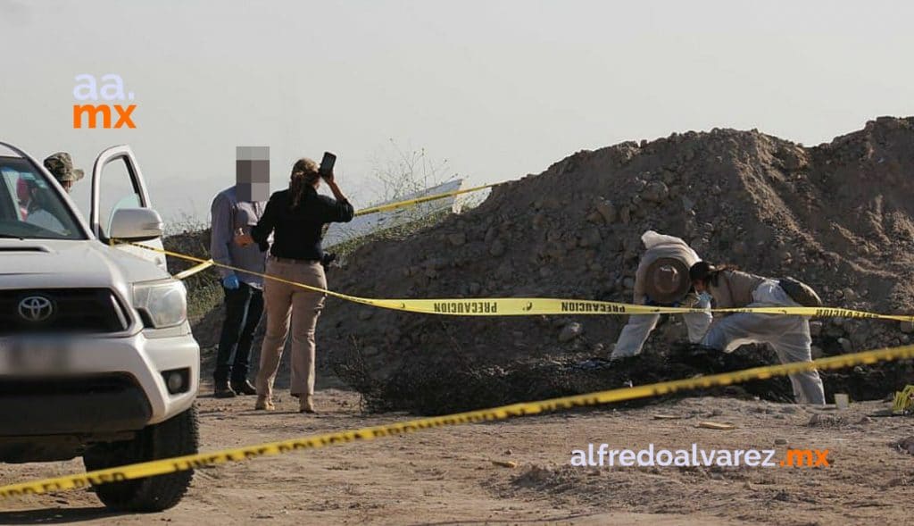 ENCUENTRAN CUERPOS CALCINADOS EN BALDíO