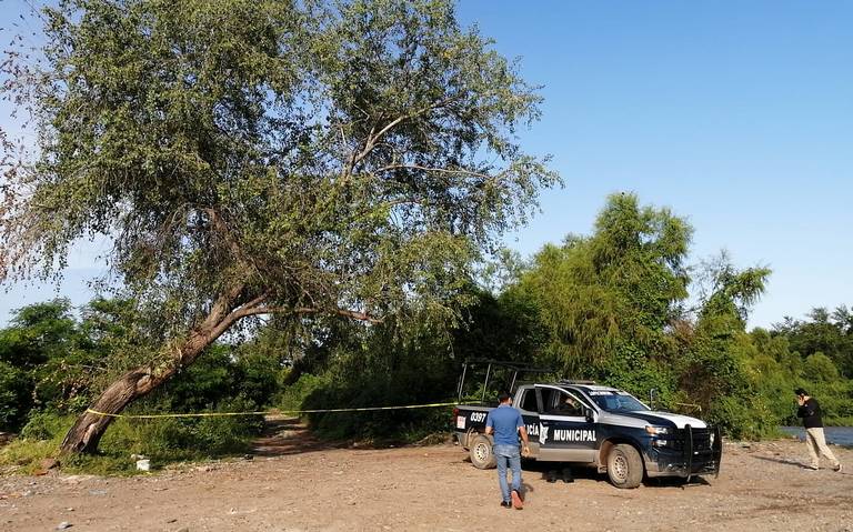 MATAN A GOLPES A JOVEN; LA DEJAN JUNTO AL RíO
