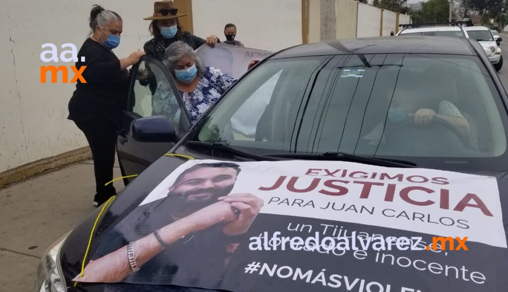 REALIZAN MANIFESTACIóN POR EL ASESINATO DE JUAN CARLOS