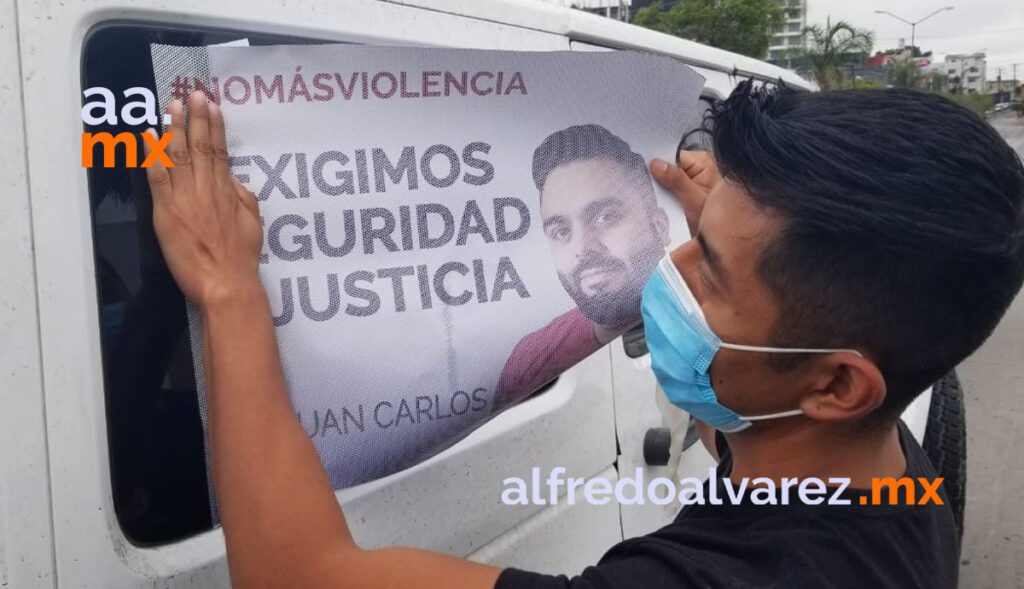 REALIZAN MANIFESTACIóN POR EL ASESINATO DE JUAN CARLOS
