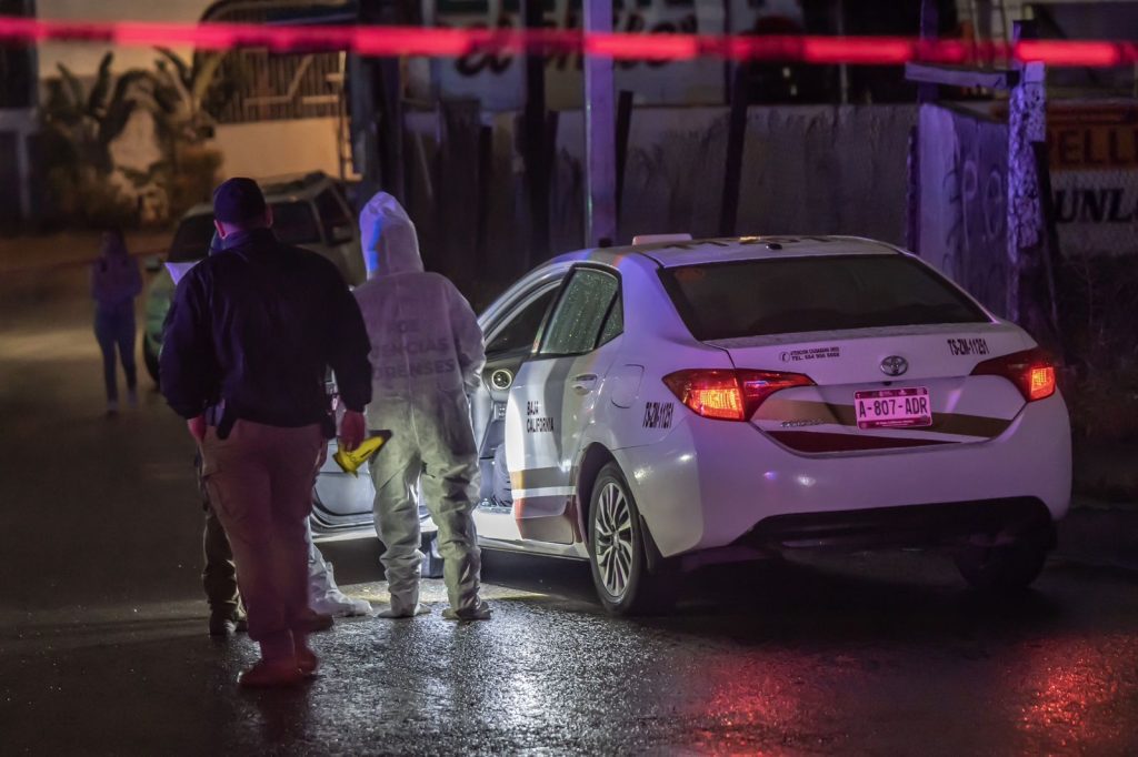 Asesinan a un taxista mientras estaba en circulación