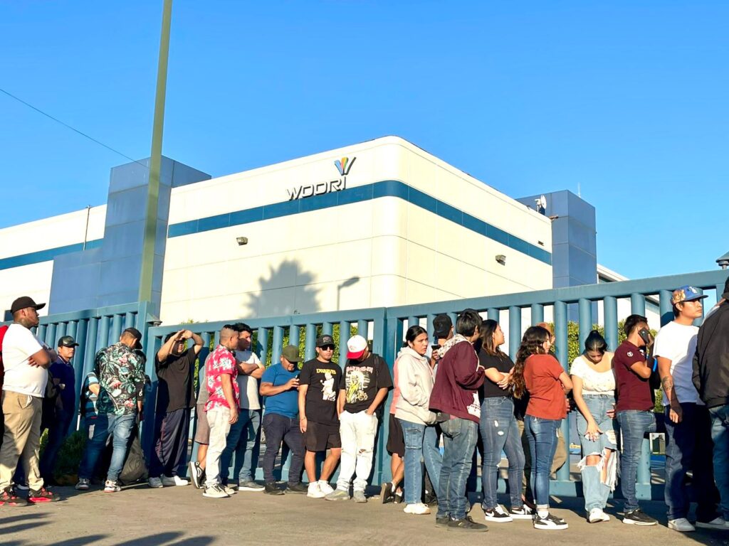 Trabajadores de Woori Printing protestan por pagos retenidos
